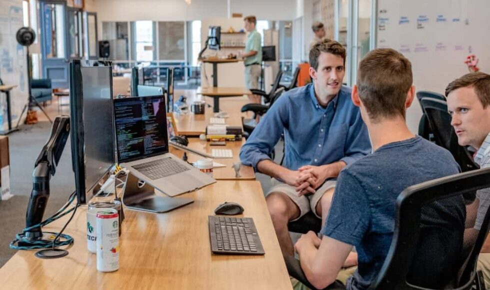 Men in Office with RMM computers