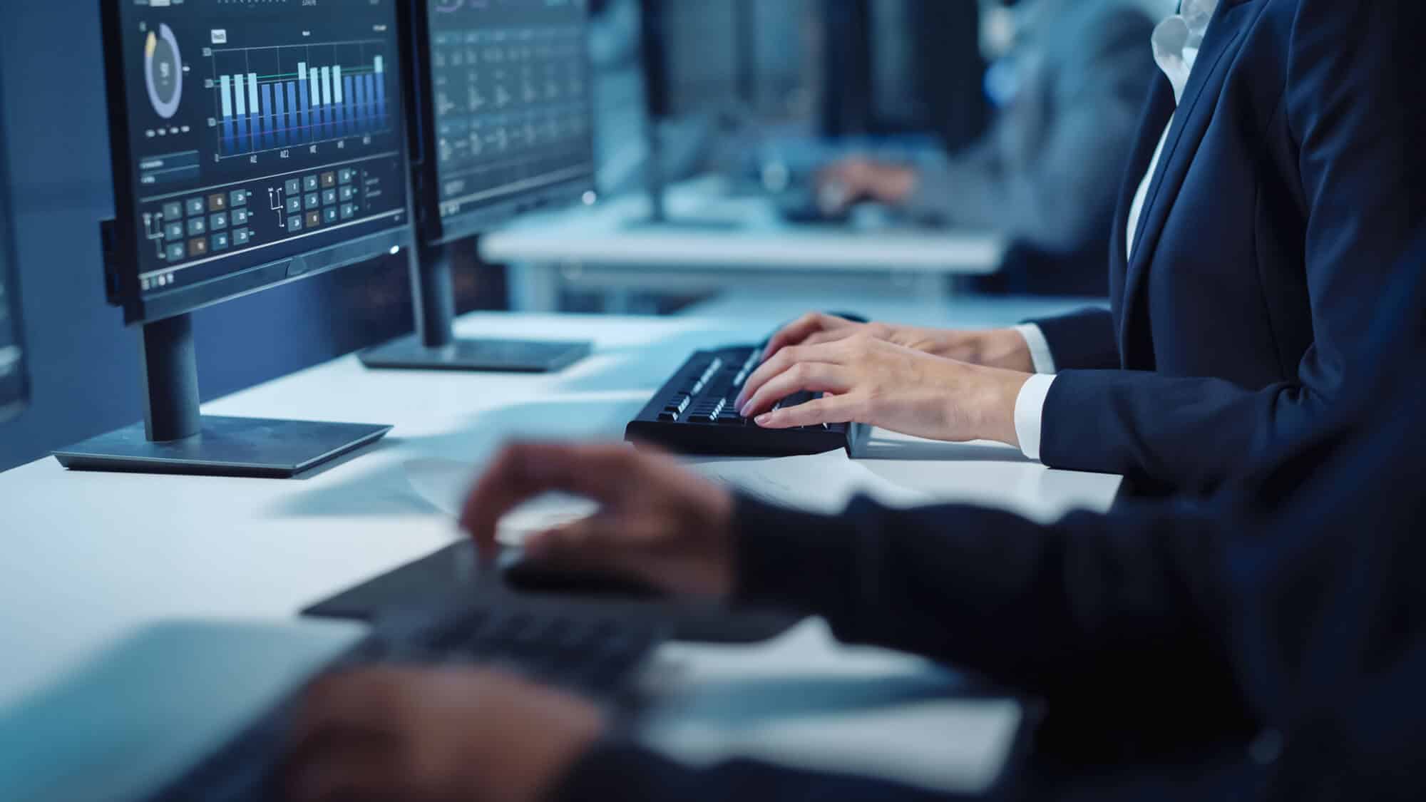 Office workers using computer